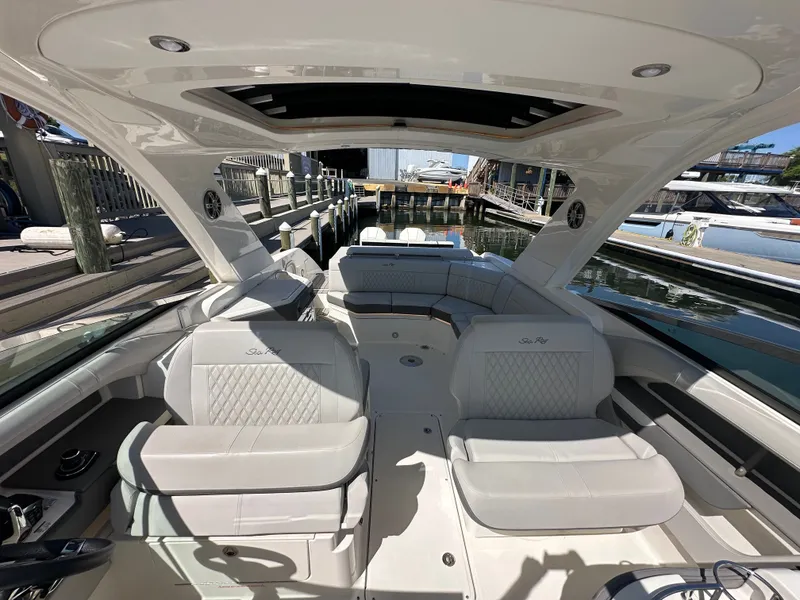 Slide: The Image of Interior of 2023 Sea Ray SLX 310 Outboard at dock. - 14