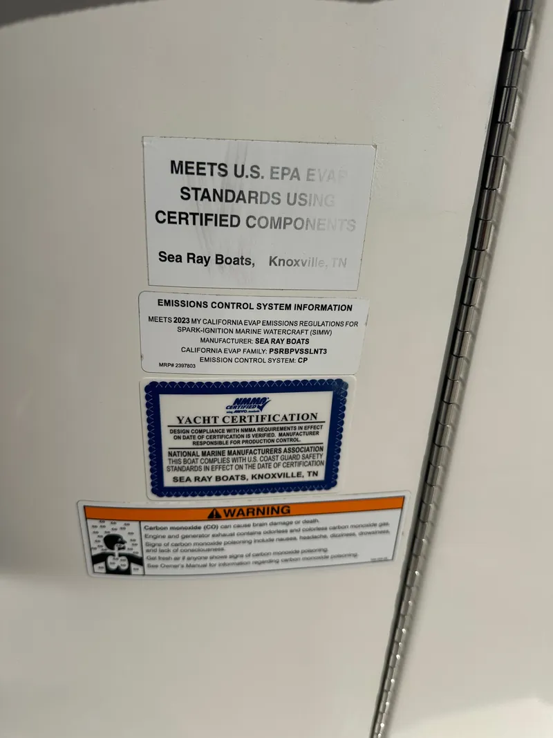 Slide: The Image of Certification labels on Sea Ray SLX 310 Outboard 2023 boat. - 18