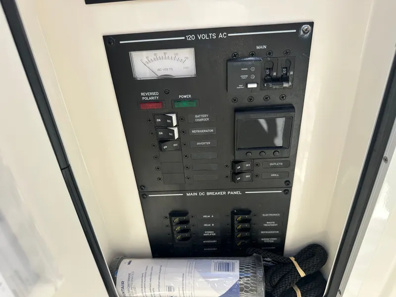 Slide: The Image of Electrical control panel of Sea Ray SLX 310 Outboard 2023. - 19