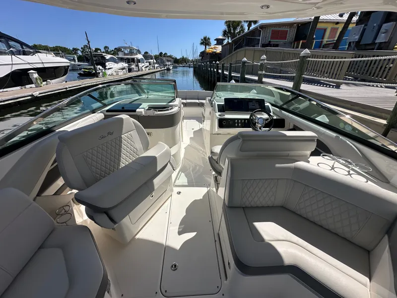 Slide: The Image of Interior view of 2023 Sea Ray SLX 310 Outboard at dock. - 30