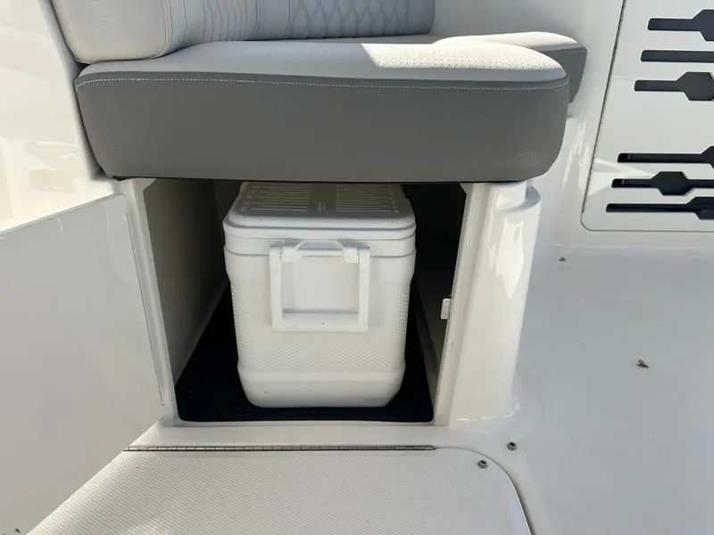 Slide: The Image of 2023 Sea Ray SLX 310 Outboard with built-in cooler compartment. - 33
