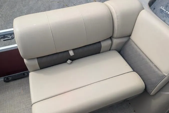 Slide: The Image of 2022 Sun Tracker Fishin' Barge 20 DLX beige and gray boat seating detail. - 5
