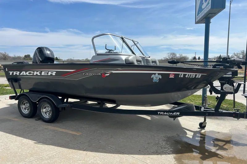 The Image of 2017 Tracker Targa V-18 Combo boat on trailer, parked outdoors. - 0