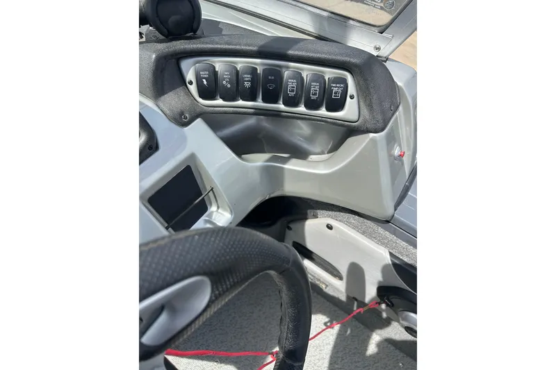 Slide: The Image of Dashboard controls of a 2017 Tracker Targa V-18 Combo boat. - 17