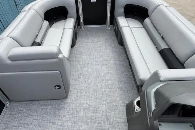 Slide: The Image of 2026 Sun Tracker Party Barge 20 DLX interior with spacious seating and modern design. - 6