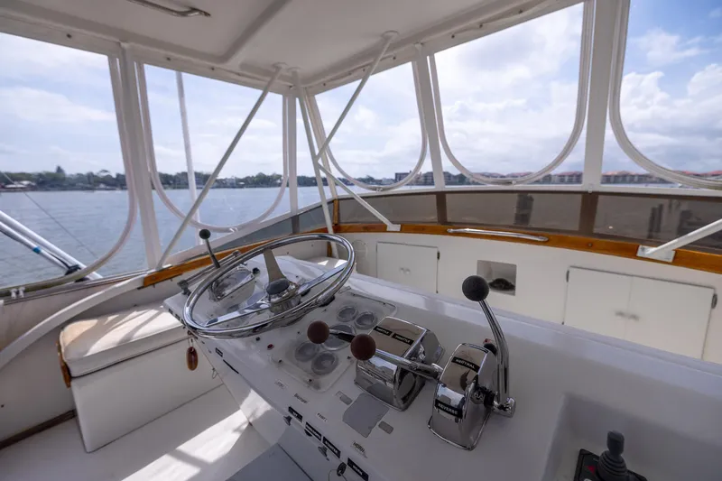 Slide: The Image of Interior helm of 1982 Post 46 Convertible yacht with steering wheel and controls. - 20