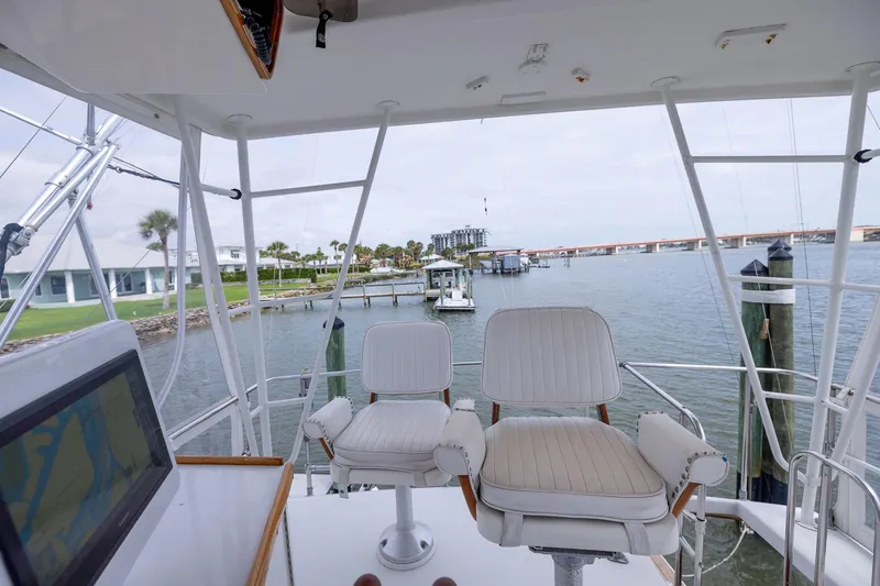 Slide: The Image of Interior view of 1982 Post 46 Convertible yacht with waterfront scenery. - 23