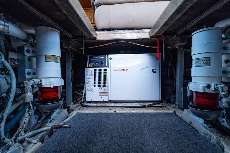 Slide: The Image of Engine room of 1982 Post 46 Convertible with Cummins Onan generator. - 51