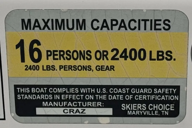 Slide: The Image of 2016 Moomba Craz boat capacity label: 16 persons or 2400 lbs, U.S. Coast Guard compliant. - 31