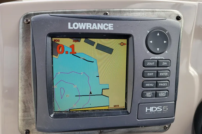 Slide: The Image of Lowrance HDS5 marine GPS displaying navigation map on a 2007 Stingray 250 CS boat. - 18