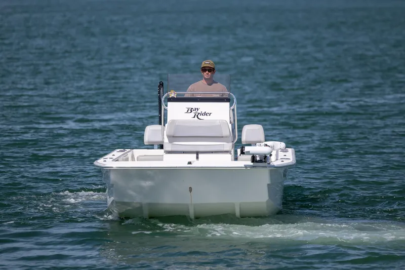 Slide: The Image of 2022 Bay Rider 2260 Skiff on open water, front view. - 2