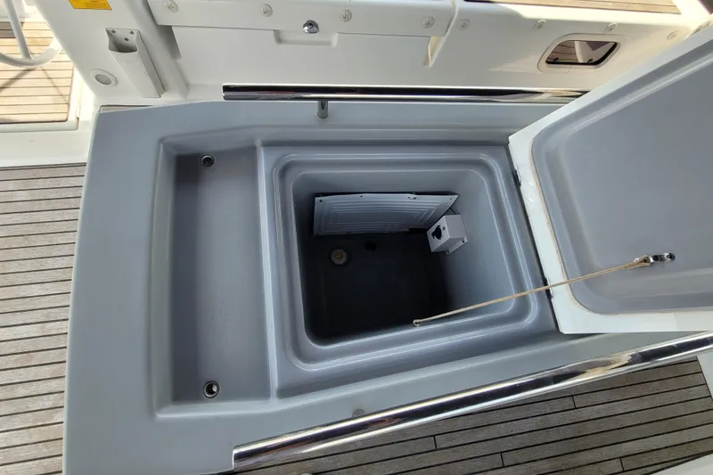 Slide: The Image of Open storage compartment on 2015 Beneteau Oceanis 45 yacht deck. - 10