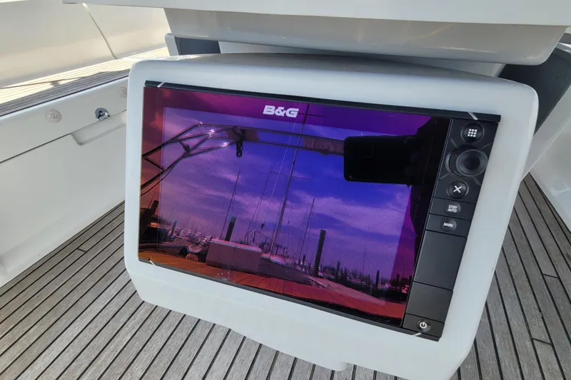 Slide: The Image of B&G navigation display on 2015 Beneteau Oceanis 45 yacht, reflecting marina view. - 12