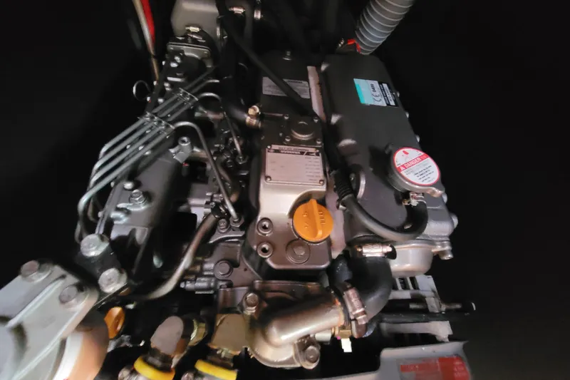 Slide: The Image of Engine of a 2015 Beneteau Oceanis 45 sailboat, showcasing mechanical components. - 36