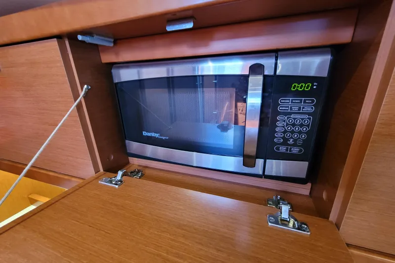 Slide: The Image of Microwave in 2015 Beneteau Oceanis 45 yacht kitchen cabinet. - 43