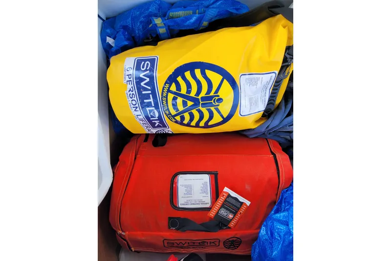 Slide: The Image of Yellow and red Switlik life rafts on a Beneteau Oceanis 45, 2015 model. - 47