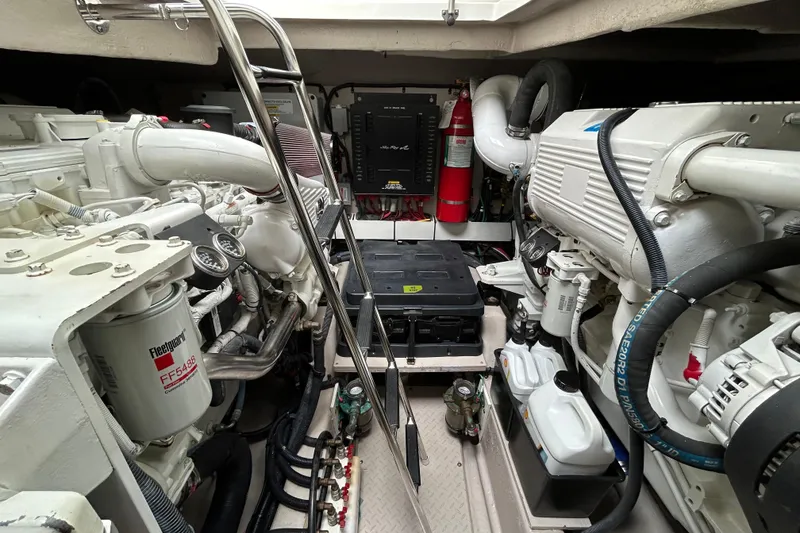 Slide: The Image of Engine room of 2009 Sea Ray 480 Sundancer yacht, featuring mechanical components and equipment. - 24