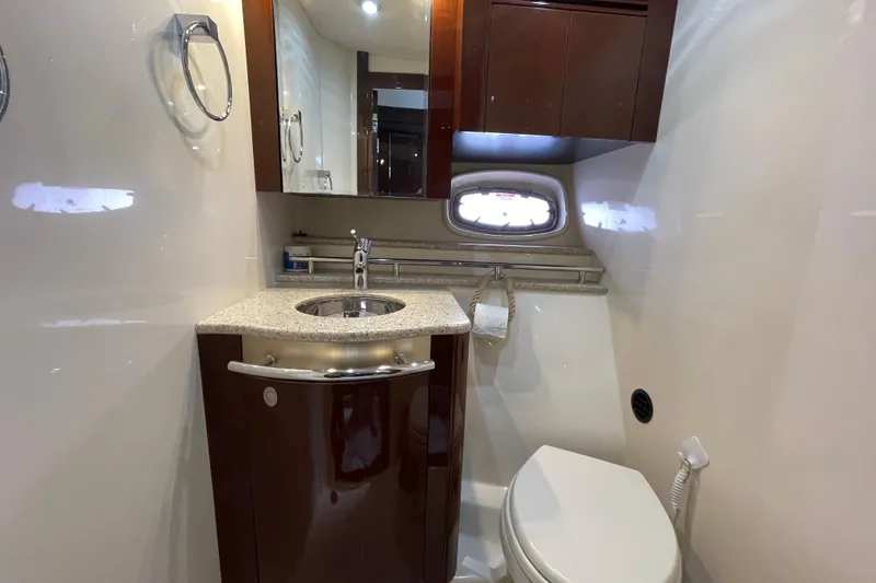 Slide: The Image of Luxurious bathroom in 2009 Sea Ray 480 Sundancer yacht with modern fixtures and elegant design. - 16
