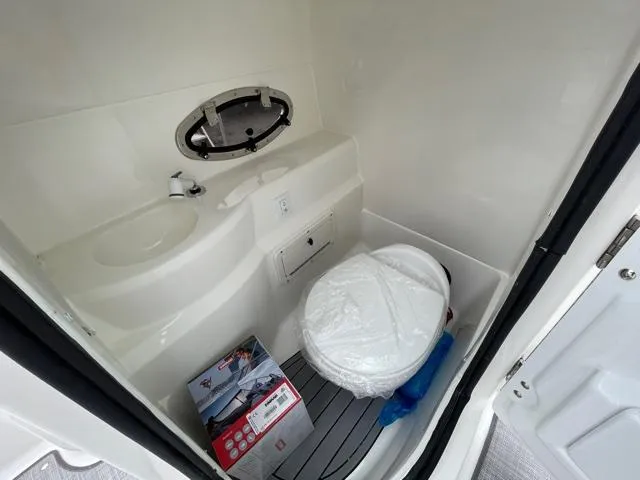 Slide: The Image of NauticStar 243DC Sport Deck 2021 - 11