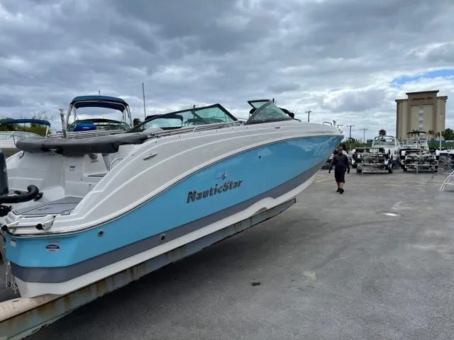 Slide: The Image of NauticStar 243DC Sport Deck 2021 - 2
