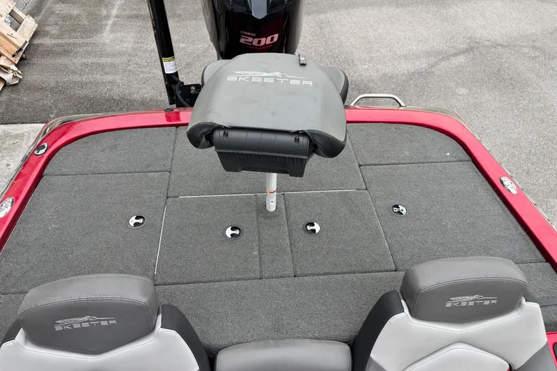 Slide: The Image of 2016 Skeeter ZX200 boat deck with seating and storage compartments. - 10