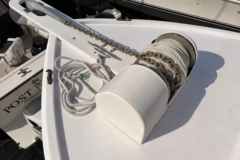 Slide: The Image of Anchor winch on 1980 Custom Chesapeake boat deck with rope and chain. - 9
