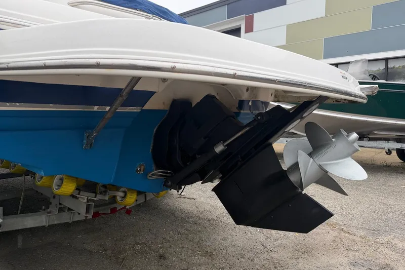 Slide: The Image of Propeller of a 2003 Chaparral 230 SSi boat on pavement. - 5