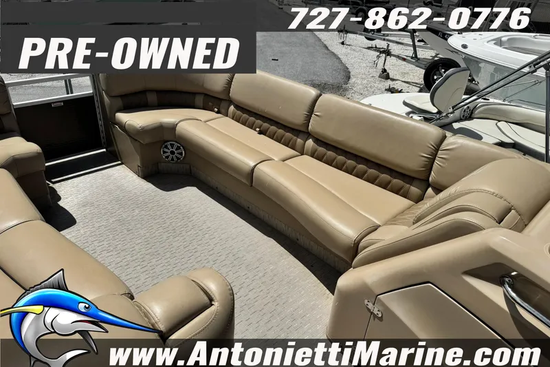 Slide: The Image of Pre-owned 2016 Bennington 2550 RS boat interior with tan seating, available at Antonietti Marine. - 10