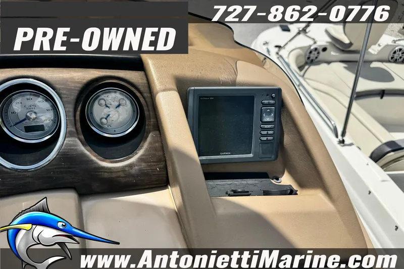 Slide: The Image of Pre-owned 2016 Bennington 2550 RS boat dashboard with gauges and GPS display. - 14