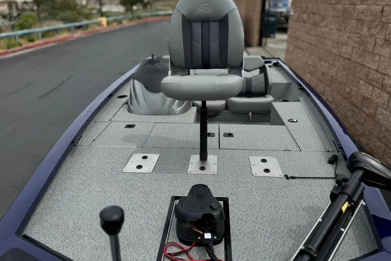 Slide: The Image of 2024 G3 Sportsman 1710 boat interior with seating and fishing deck features. - 11