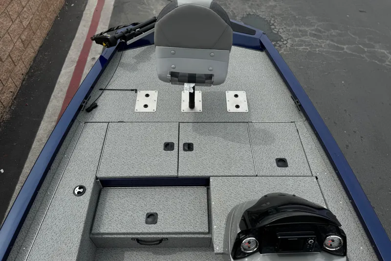 Slide: The Image of 2024 G3 Sportsman 1710 boat deck with seating and storage compartments. - 12