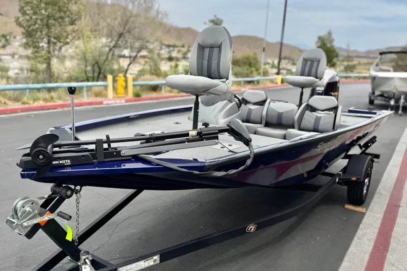 Slide: The Image of 2024 G3 Sportsman 1710 fishing boat on trailer, featuring comfortable seating and modern design. - 3