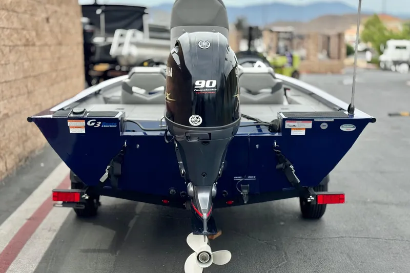 Slide: The Image of 2024 G3 Sportsman 1710 boat with Yamaha 90 engine, rear view on trailer. - 4