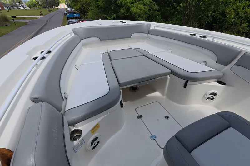 Slide: The Image of 2021 NauticStar 28 XS boat interior with spacious seating and modern design. - 5