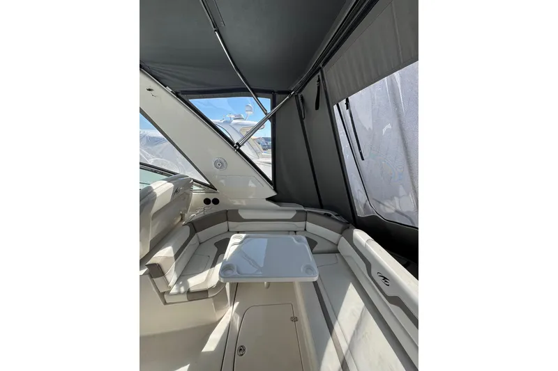 Slide: The Image of Interior of 2009 Monterey 320 Sport Yacht with seating and canopy. - 22