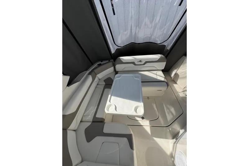 Slide: The Image of Luxurious white seating inside 2009 Monterey 320 Sport Yacht cabin. - 24