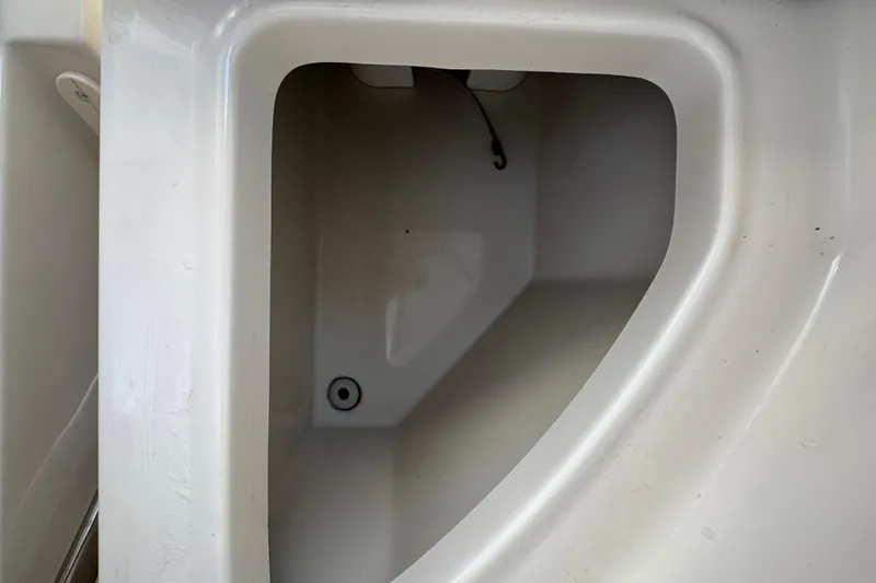 Slide: The Image of Open storage compartment on a 2009 Monterey 320 Sport Yacht. - 31