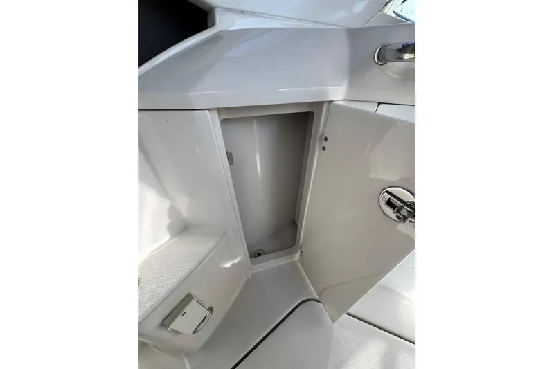 Slide: The Image of Interior view of 2009 Monterey 320 Sport Yacht cockpit with steering wheel and controls. - 34