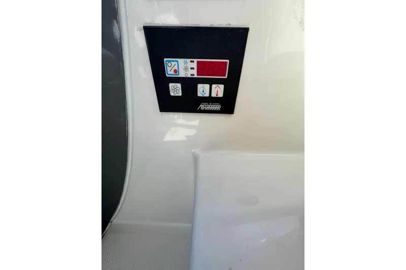 Slide: The Image of Interior of 2009 Monterey 320 Sport Yacht with wood accents and comfortable seating. - 41