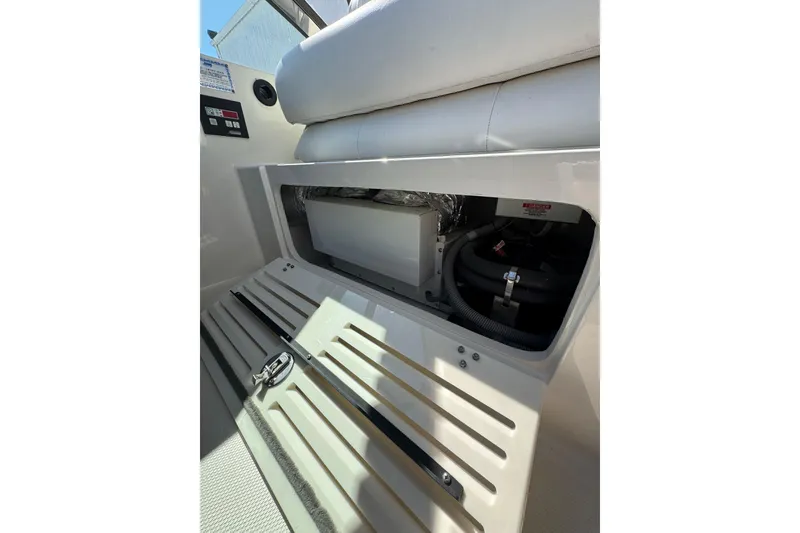 Slide: The Image of Luxurious interior of 2009 Monterey 320 Sport Yacht with leather seating and wooden cabinetry. - 42