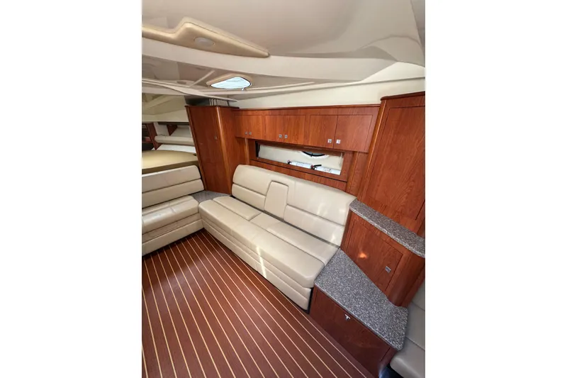 Slide: The Image of Interior of 2009 Monterey 320 Sport Yacht with cozy seating and wood accents. - 45