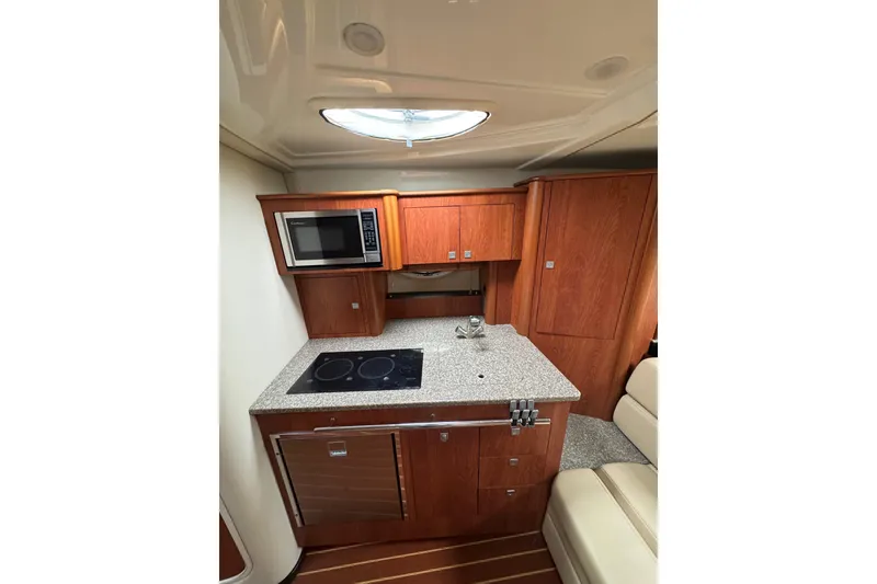Slide: The Image of Stainless steel sink in 2009 Monterey 320 Sport Yacht kitchen area. - 51