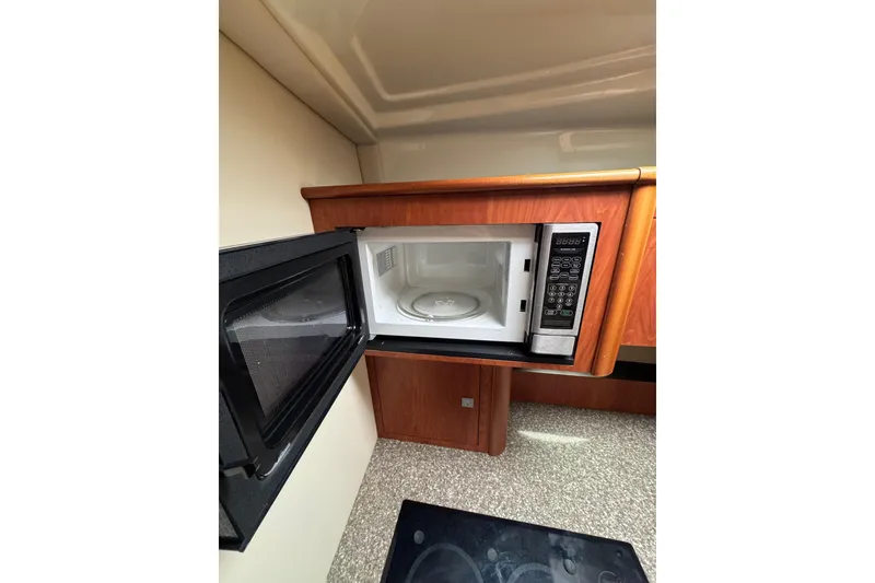 Slide: The Image of Bathroom interior of 2009 Monterey 320 Sport Yacht with sink and toilet. - 53