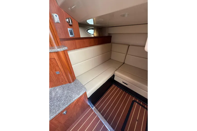 Slide: The Image of Bow of a 2009 Monterey 320 Sport Yacht with anchor and deck fittings. - 61