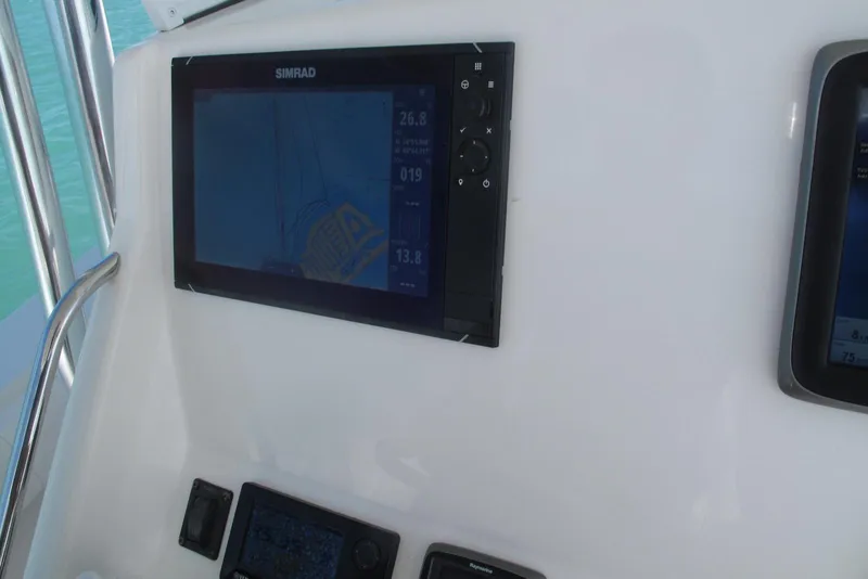 Slide: The Image of Simrad navigation display on 2013 Regulator 32 Forward Seating boat console. - 10