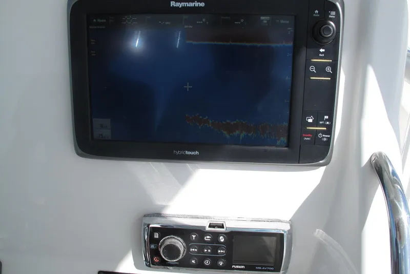 Slide: The Image of Raymarine HybridTouch display and Fusion MS-AV700 unit on 2013 Regulator 32 Forward Seating boat. - 11