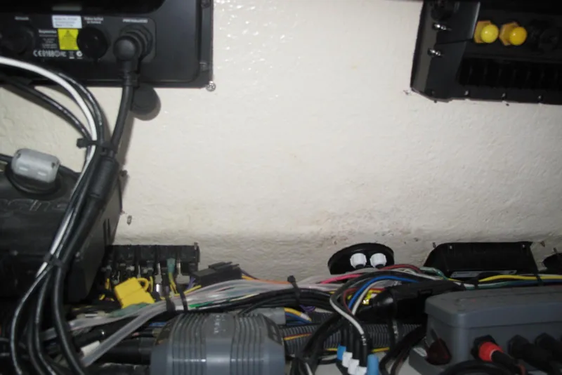 Slide: The Image of Electrical wiring and components inside a 2013 Regulator 32 Forward Seating boat. - 20