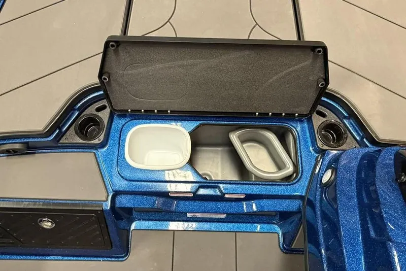 Slide: The Image of 2026 Nitro Z20 XL Pro boat storage compartment with open lid, showcasing interior features. - 15