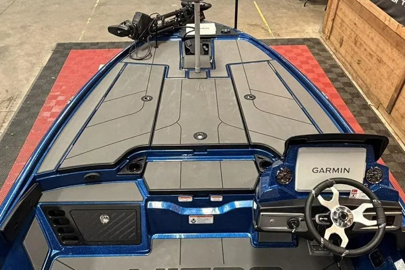 Slide: The Image of 2026 Nitro Z20 XL Pro boat interior with Garmin navigation system, sleek design, and spacious deck. - 7
