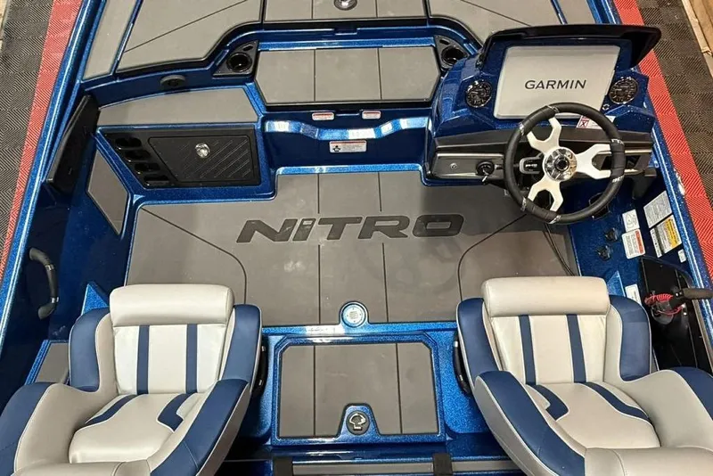 Slide: The Image of 2026 Nitro Z20 XL Pro boat interior with Garmin system and dual seats. - 9
